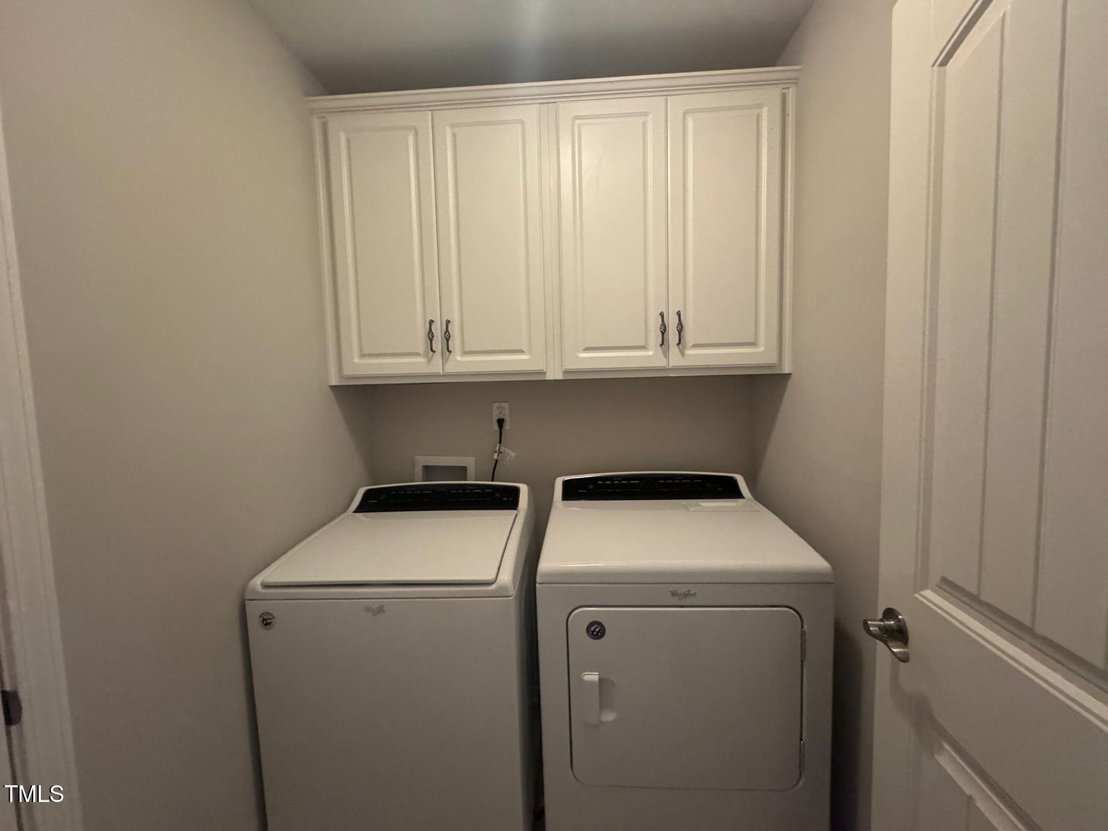 8008 Reedybrook Crossing Apex, NC 27523 - Photo 10 of 27 a utility room with dryer and washer