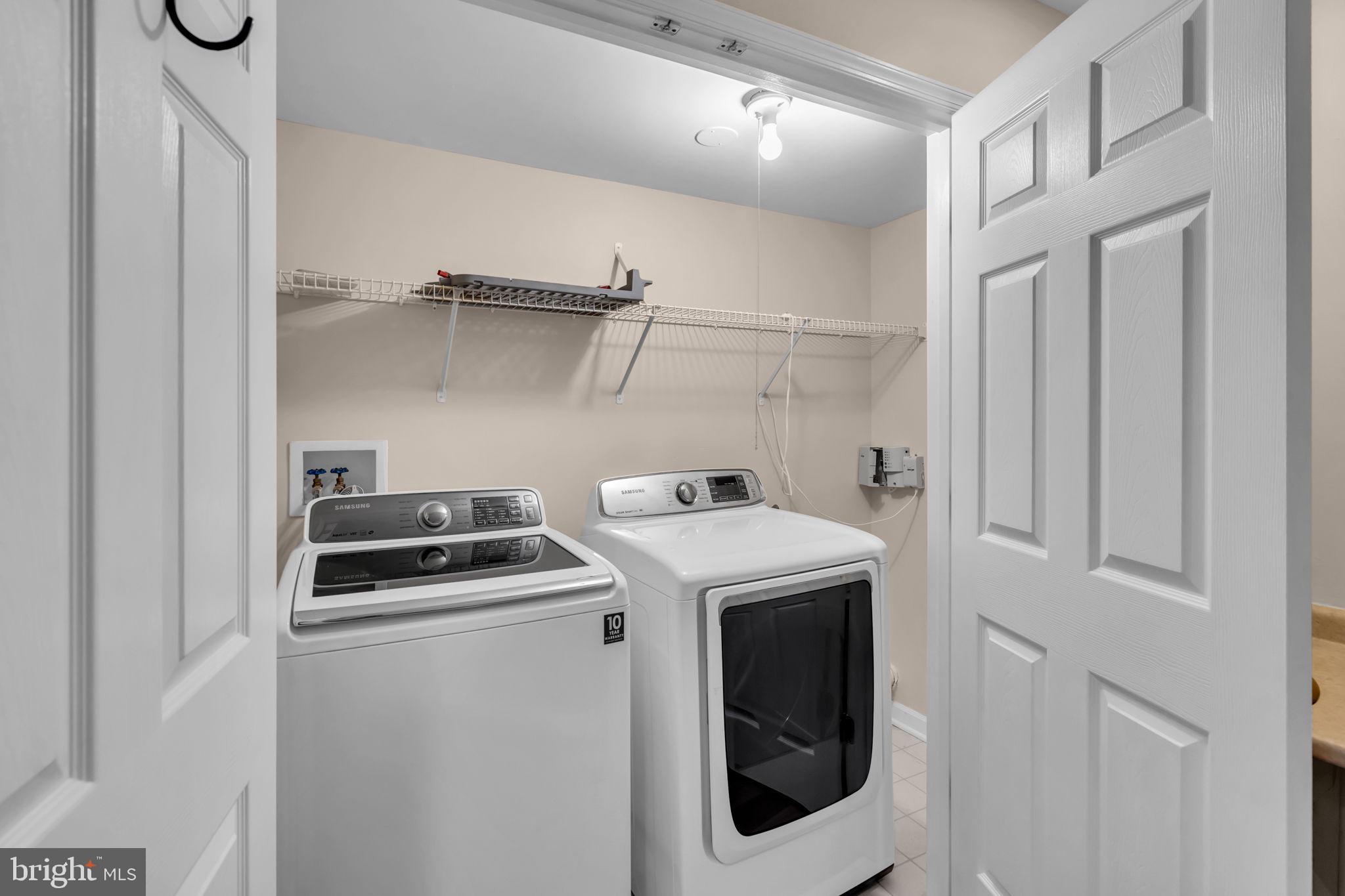21644 Frame Square Broadlands, VA 20148 - Photo 33 of 38 a utility room with dryer and washer
