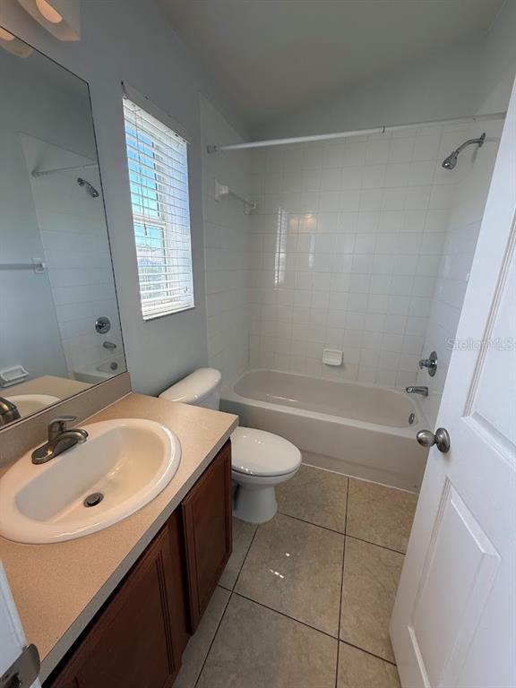 1567 Blue Magnolia Road Brandon, FL 33510 - Photo 20 of 23 a bathroom with a sink a toilet and shower