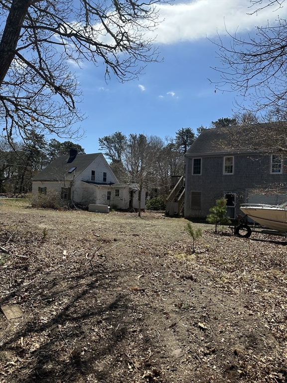 85 Telegraph Road Dennis, MA 02639 - Photo 3 of 6 a view of house with outdoor space