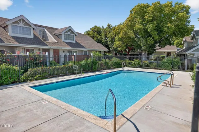 a view of a house with swimming pool