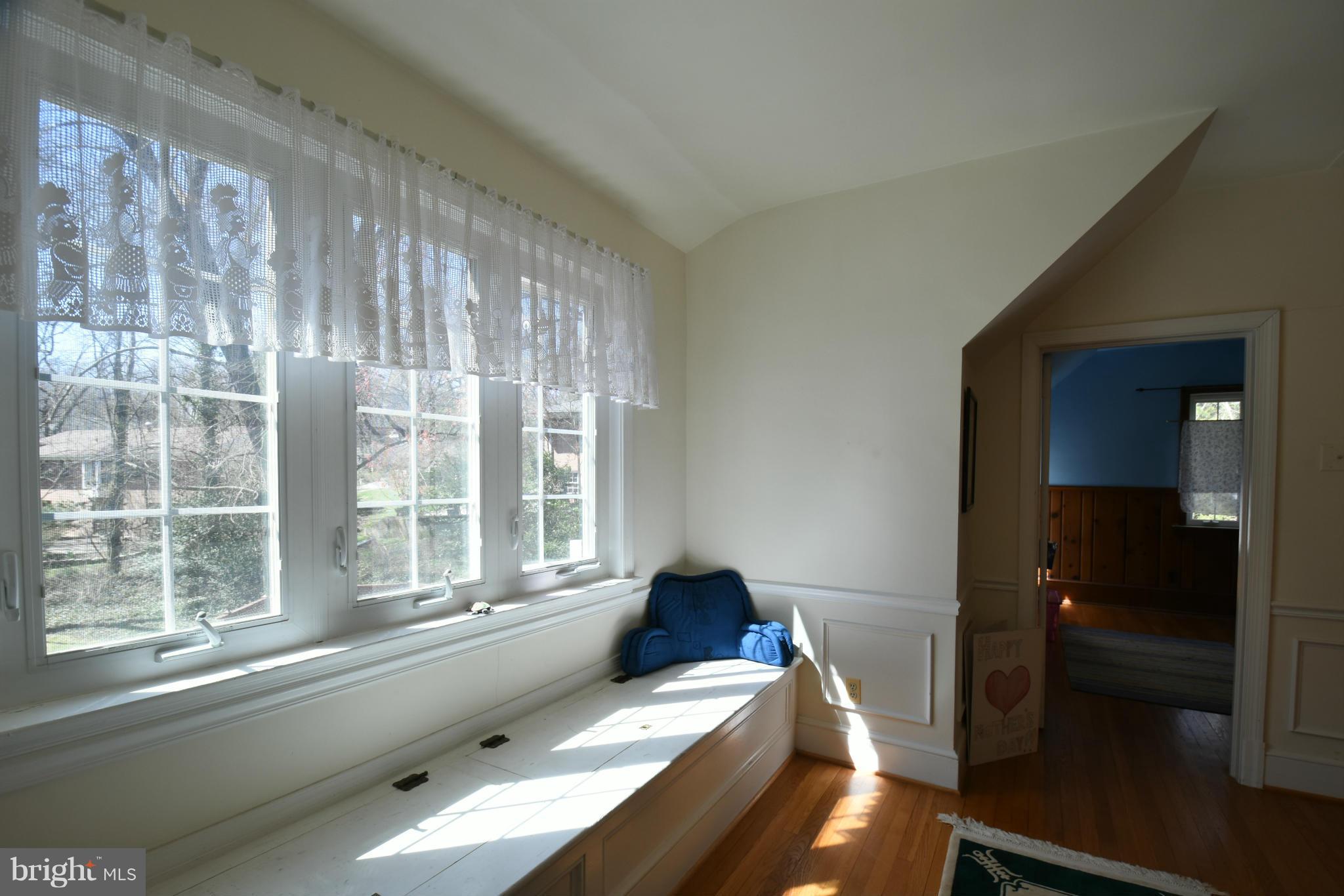 5911 Chesterbrook Road McLean, VA 22101 - Photo 18 of 28 a living room with furniture and a large window