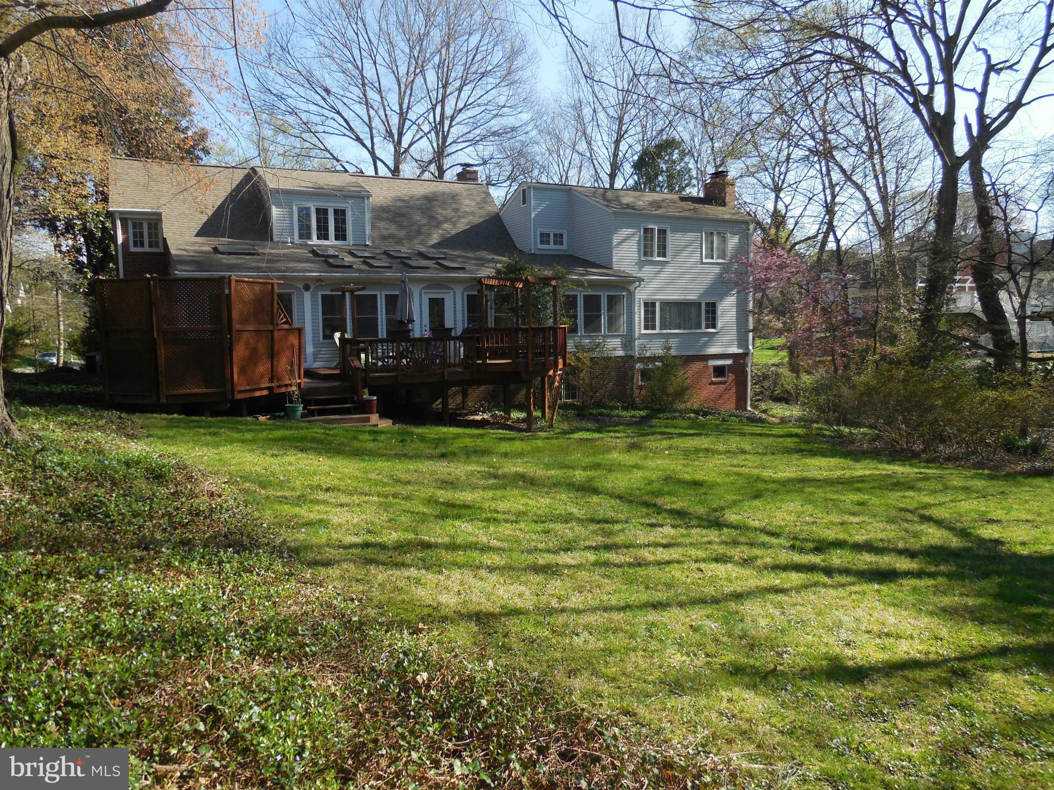 5911 Chesterbrook Road McLean, VA 22101 - Photo 28 of 28 a view of house with a big yard