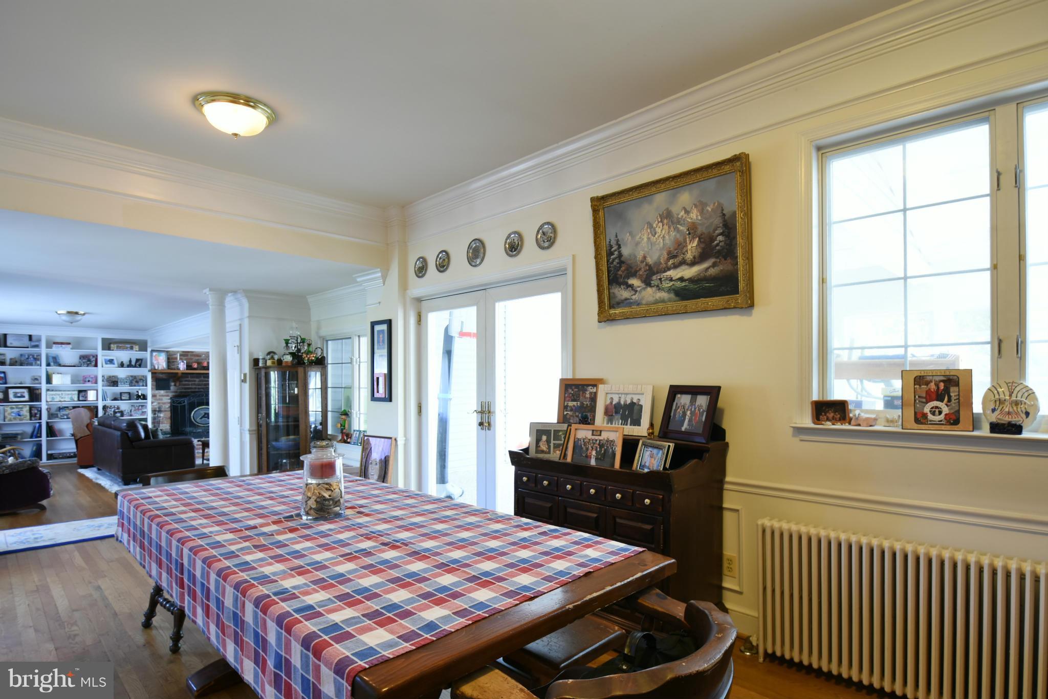 5911 Chesterbrook Road McLean, VA 22101 - Photo 5 of 28 a view of a dining room with furniture