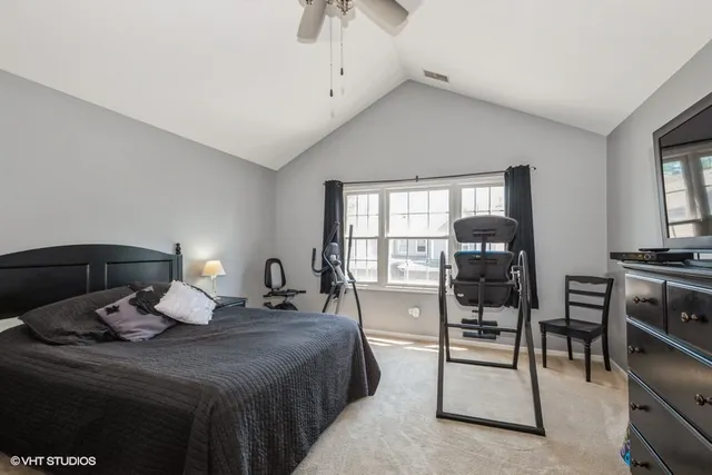 a bedroom with furniture and a window