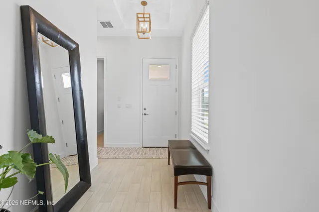 wooden floor view with a swimming pool