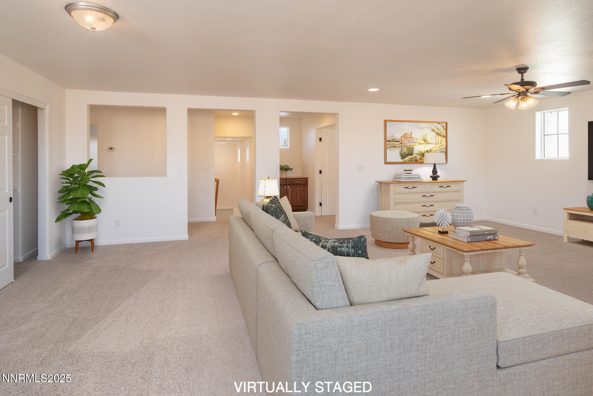 2085 Long Hollow Drive Reno, NV 89521 - Photo 12 of 42 a living room with furniture and a chandelier
