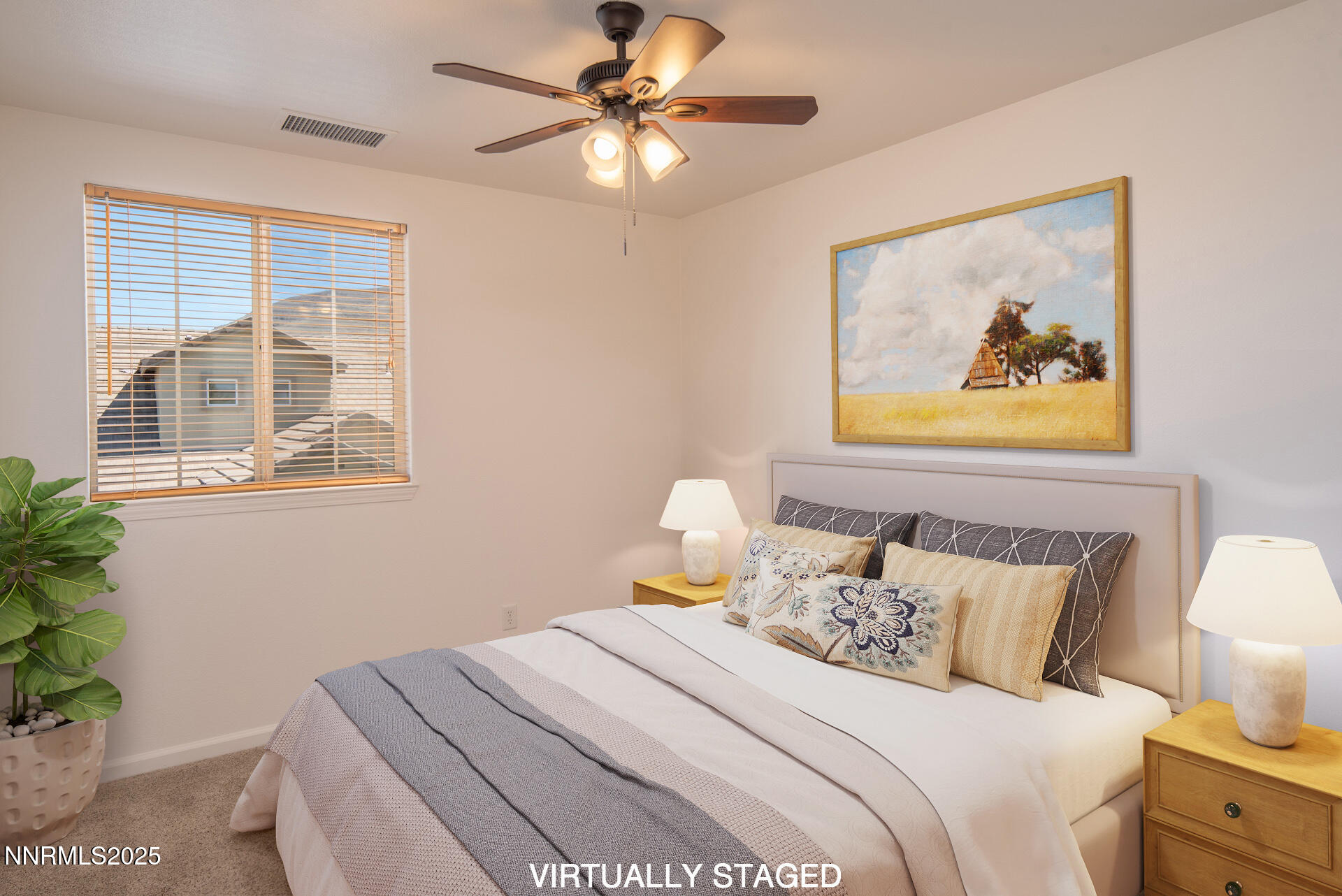 2085 Long Hollow Drive Reno, NV 89521 - Photo 19 of 42 a bedroom with a bed and a painting on the wall