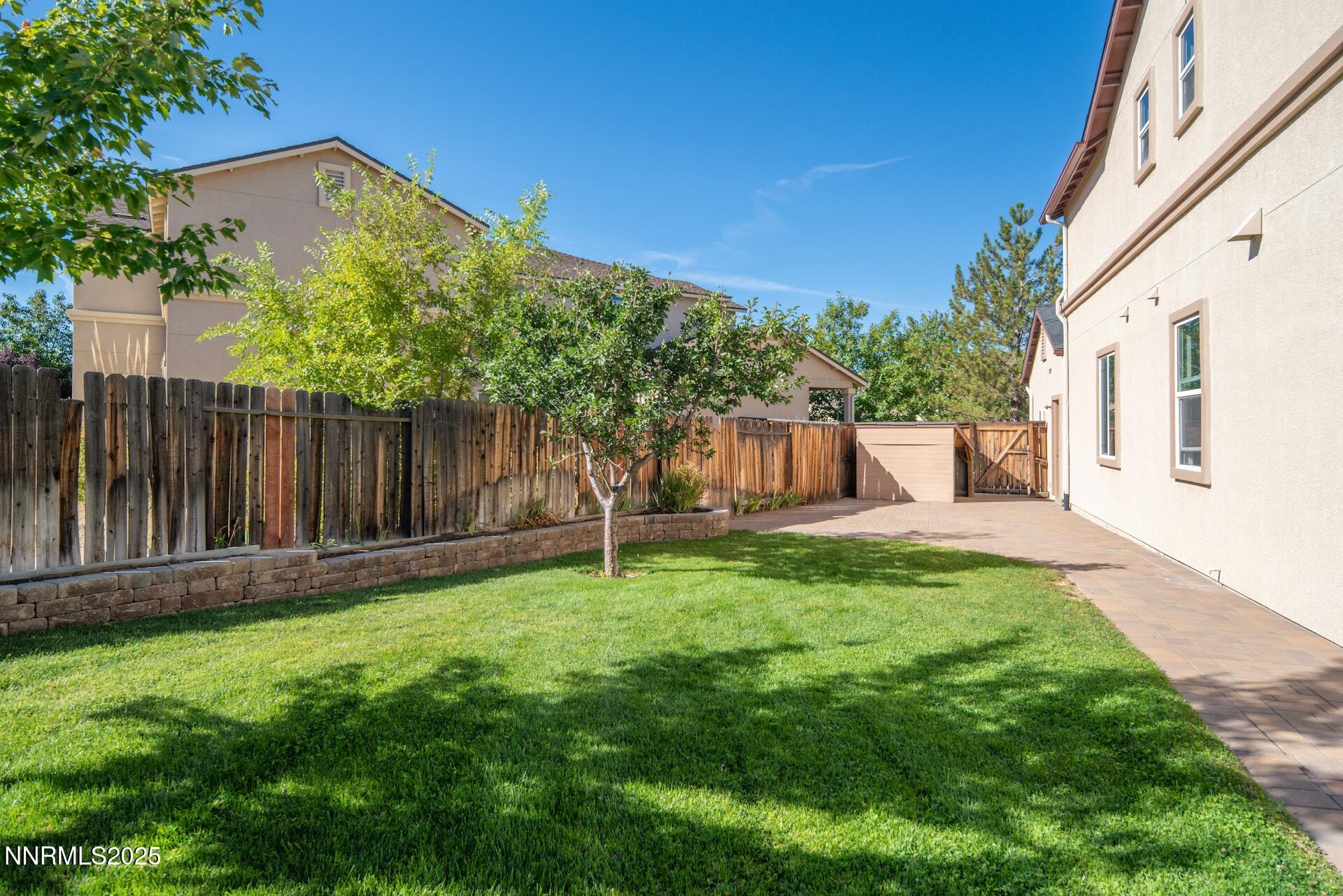 2085 Long Hollow Drive Reno, NV 89521 - Photo 2 of 42 a view of a back yard with green space