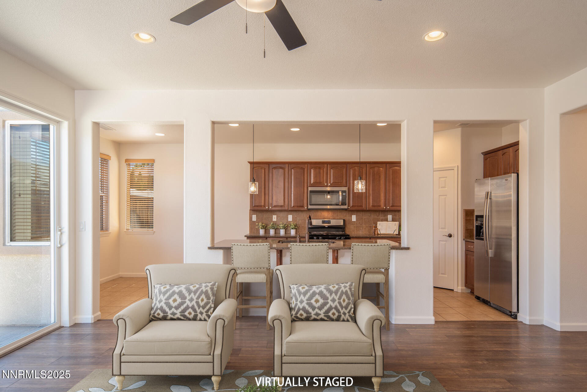 2085 Long Hollow Drive Reno, NV 89521 - Photo 8 of 42 a living room with furniture and a wooden floor
