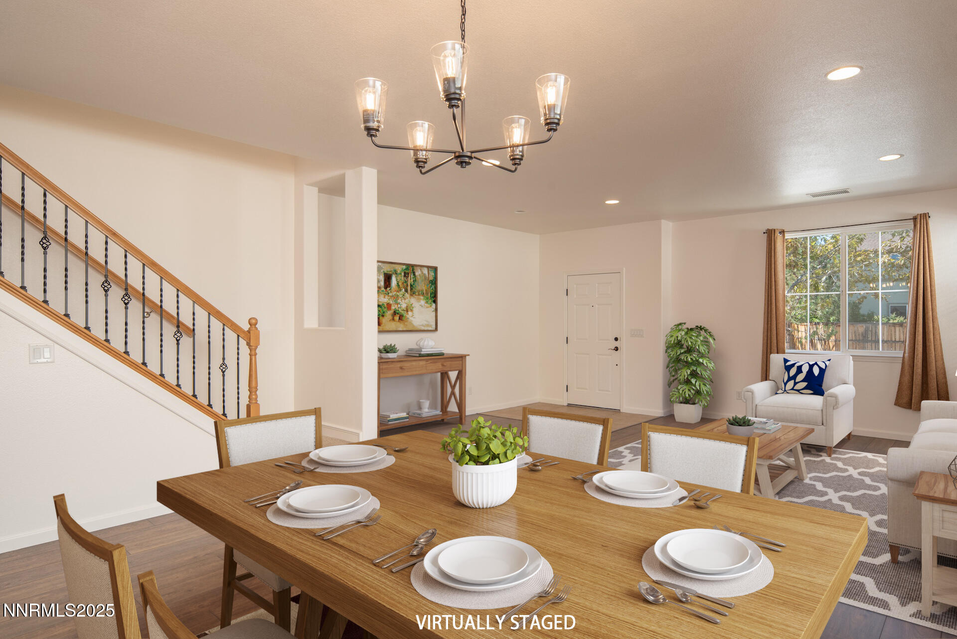 2085 Long Hollow Drive Reno, NV 89521 - Photo 10 of 42 a dining room with furniture a rug and wooden floor