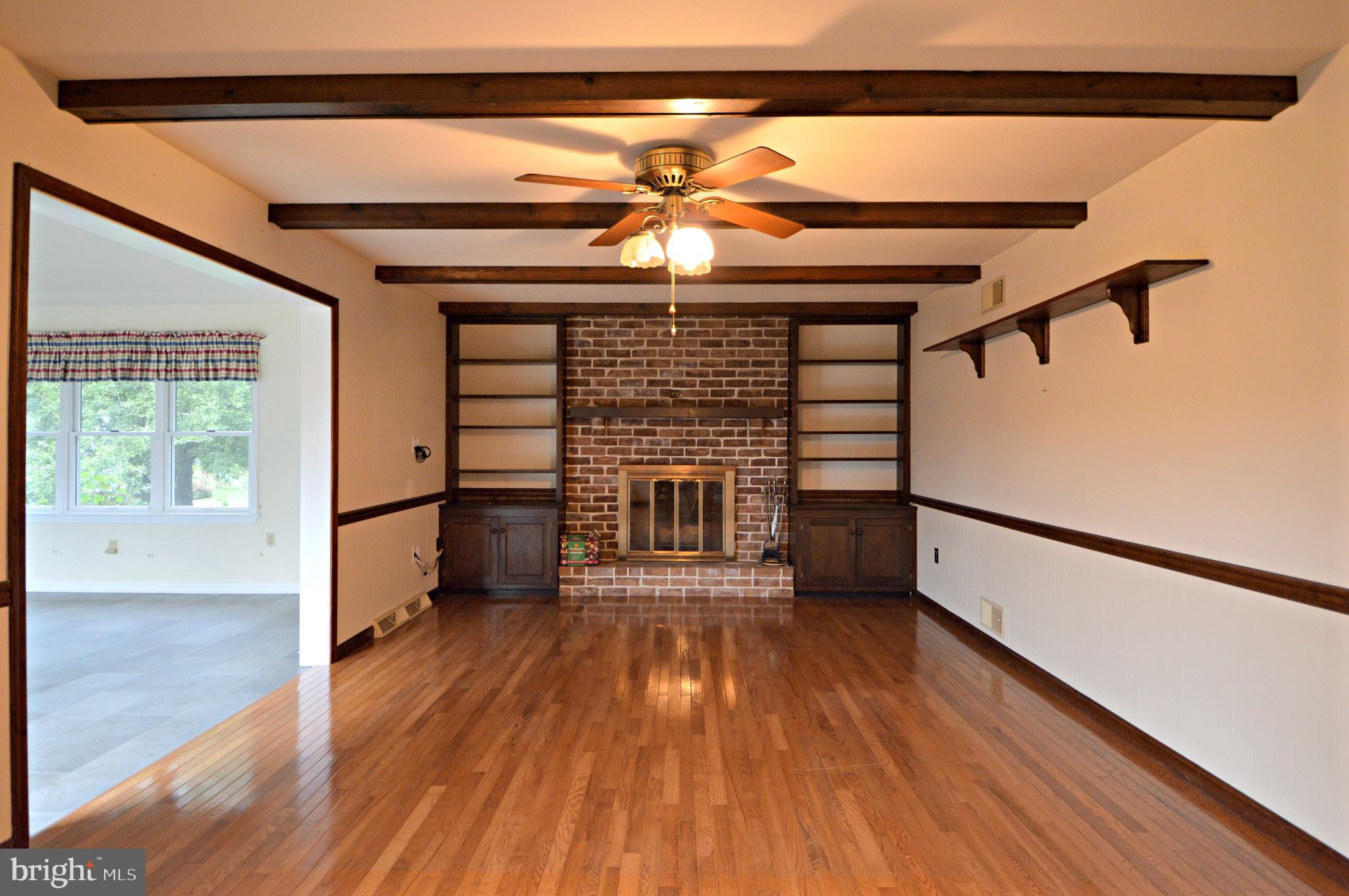 114 Pleasant View Drive Lititz, PA 17543 - Photo 10 of 26 Family room w/wood burning fireplace