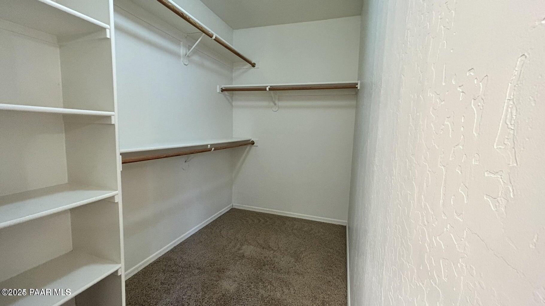 3101 North Corrine Drive, Unit 1 Prescott Valley, AZ 86314 - Photo 7 of 16 a view of an empty walk in closet