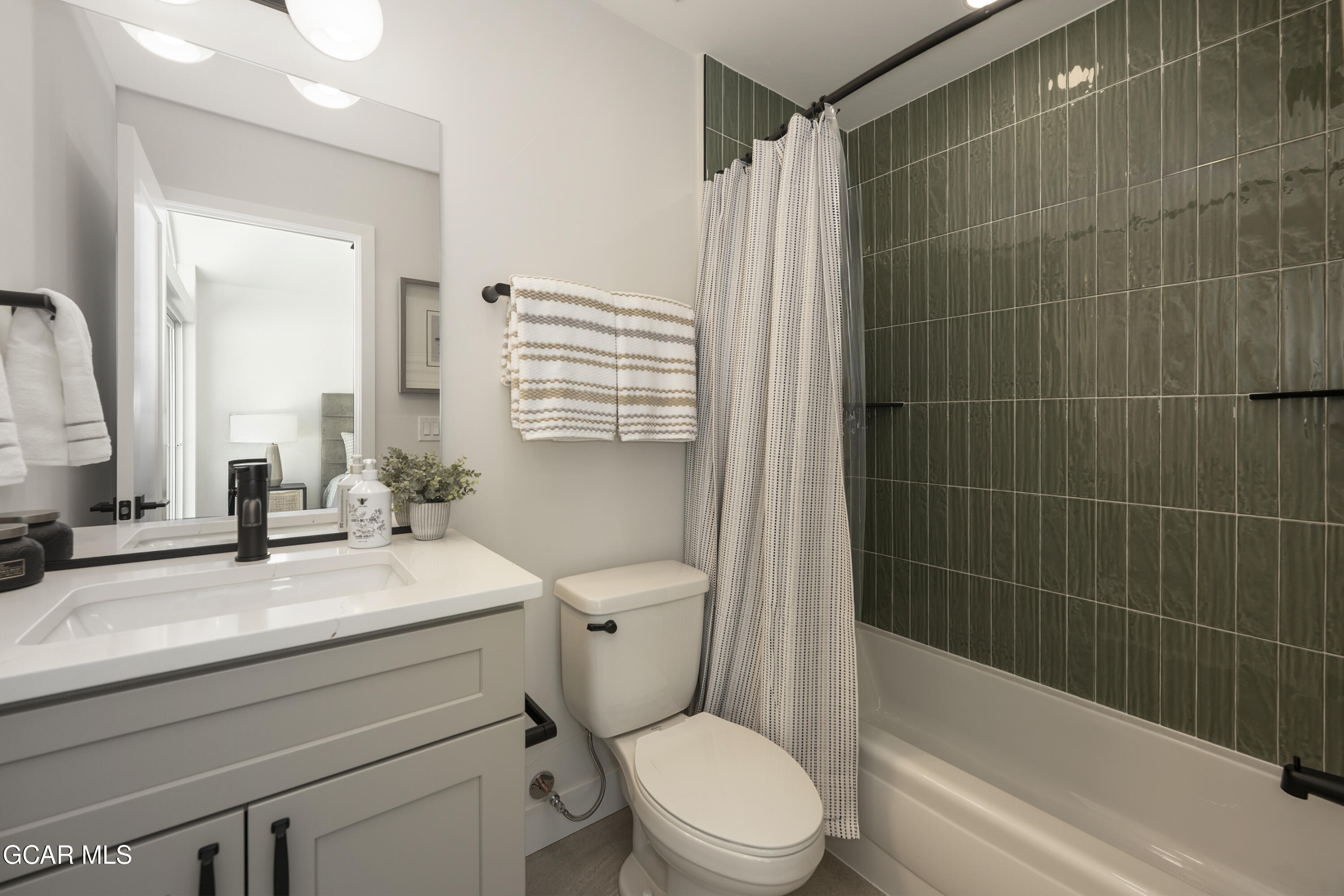 30 Wheeler Road Winter Park, CO 80482 - Photo 33 of 42 a bathroom with a sink a toilet and shower