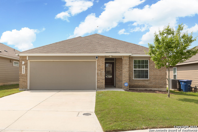 a front view of house with yard