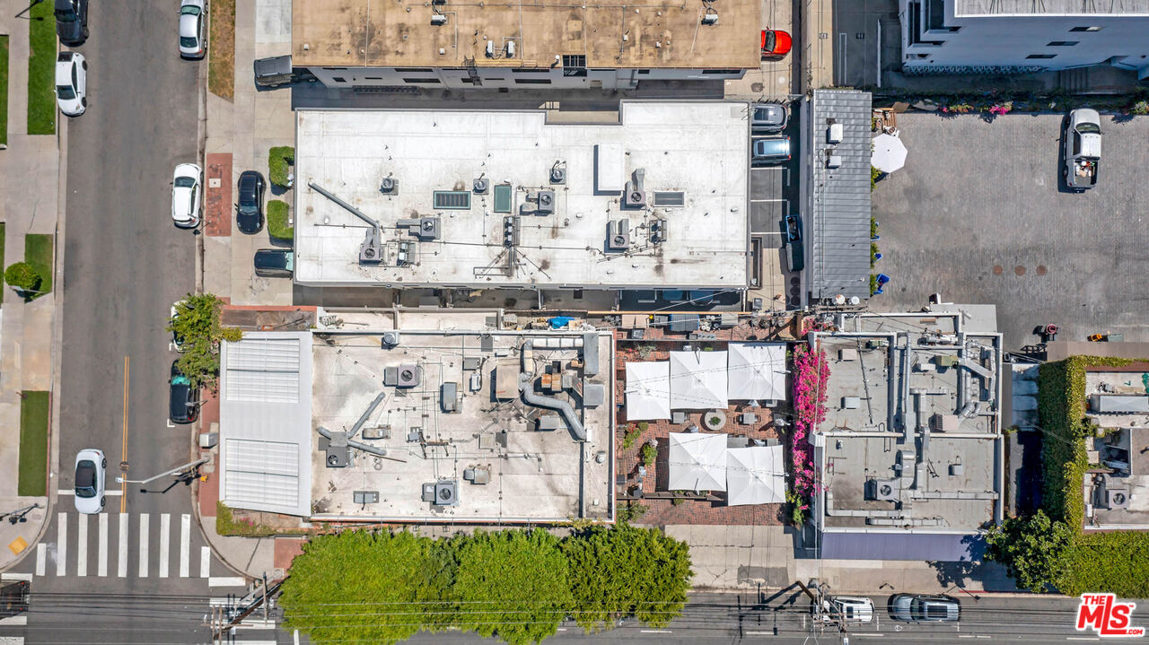 309 South Hamel Road Los Angeles, CA 90048 - Photo 20 of 34 a aerial view of multi story residential apartment building with yard