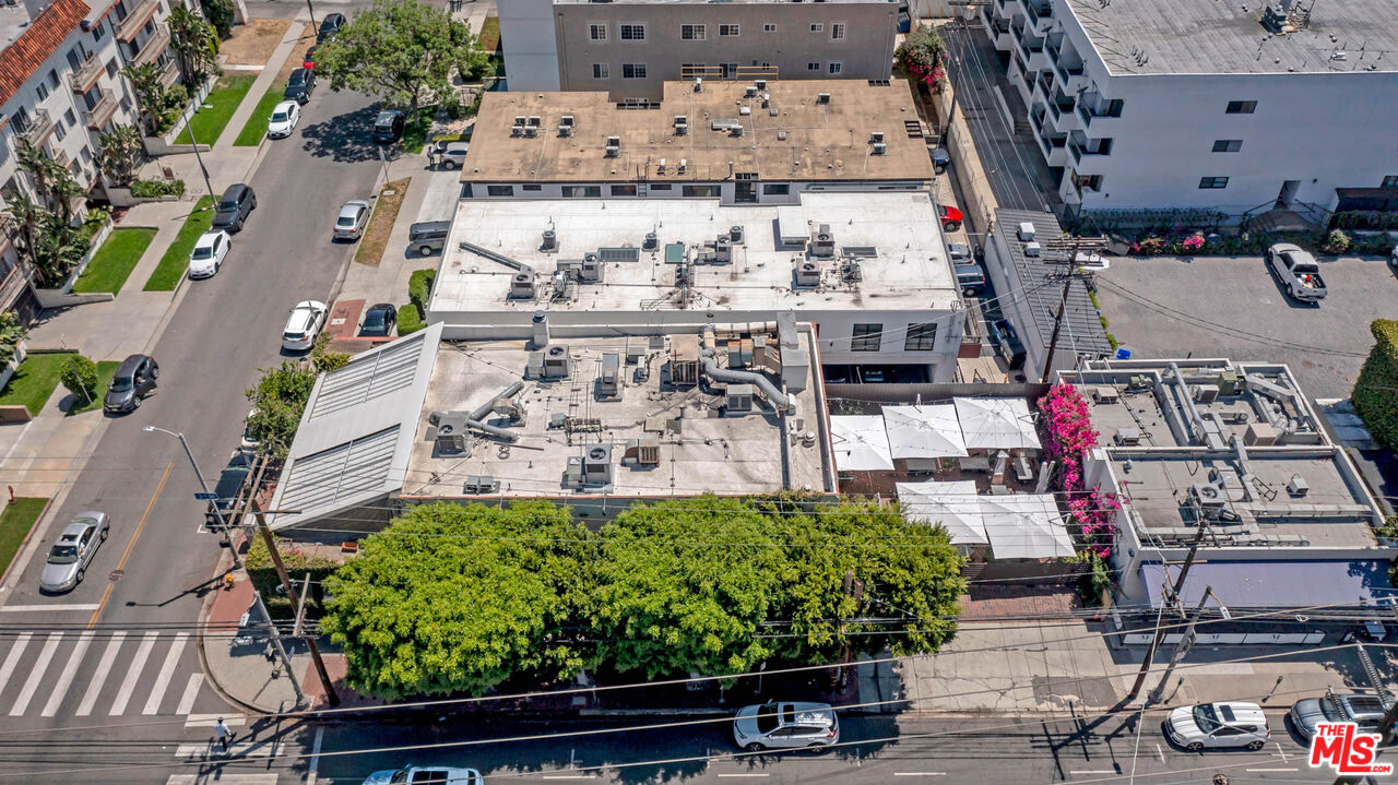 309 South Hamel Road Los Angeles, CA 90048 - Photo 21 of 34 an aerial view of a large building with a yard