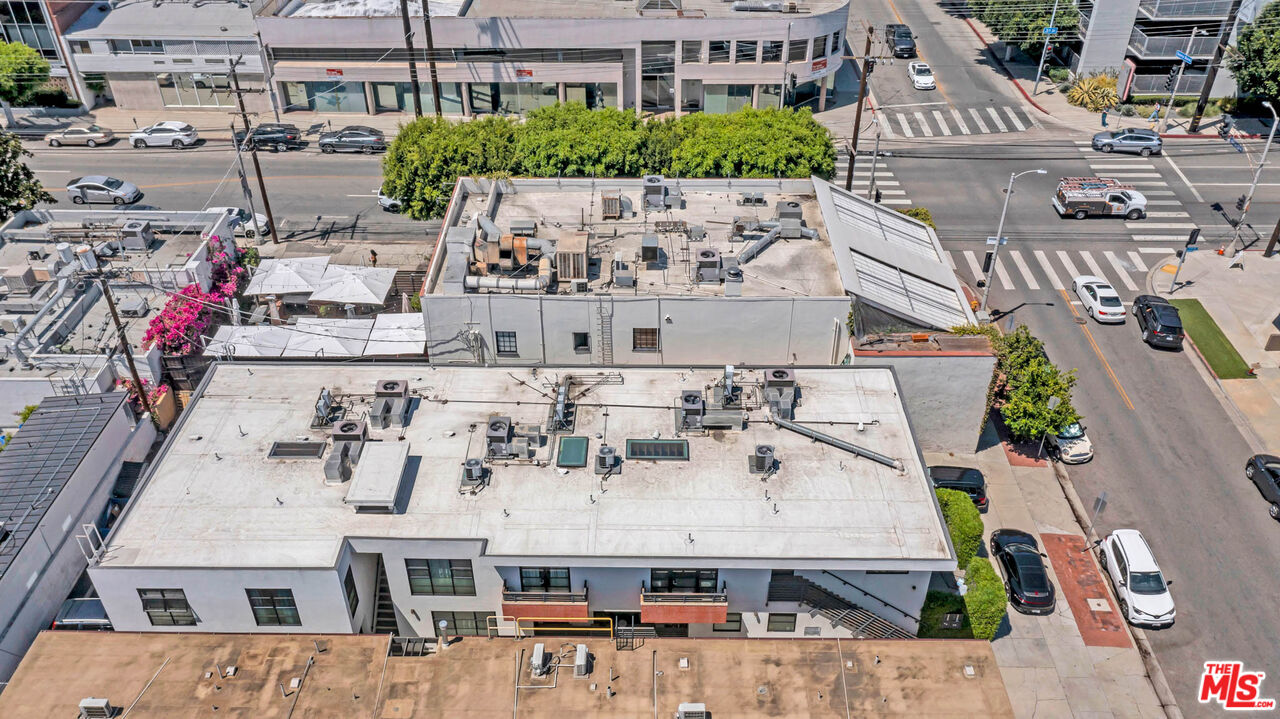 309 South Hamel Road Los Angeles, CA 90048 - Photo 28 of 34 a view of building with an outdoor space