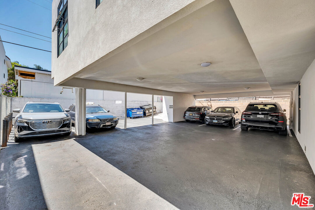309 South Hamel Road Los Angeles, CA 90048 - Photo 8 of 34 a view of parking space with parked cars