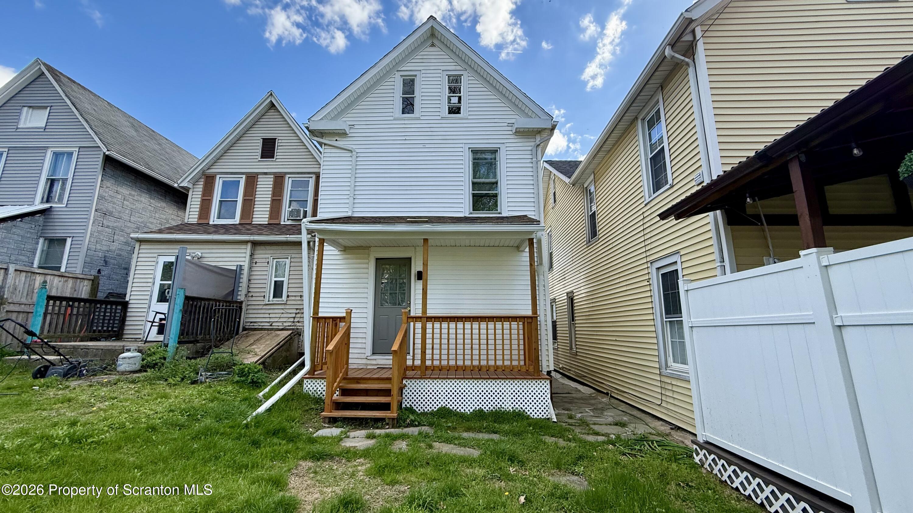1032 Chestnut Street Sunbury, PA 17801 - Photo 18 of 25 a front view of a house with a yard