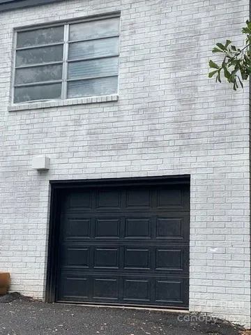 a bathroom with a toilet a sink and shower