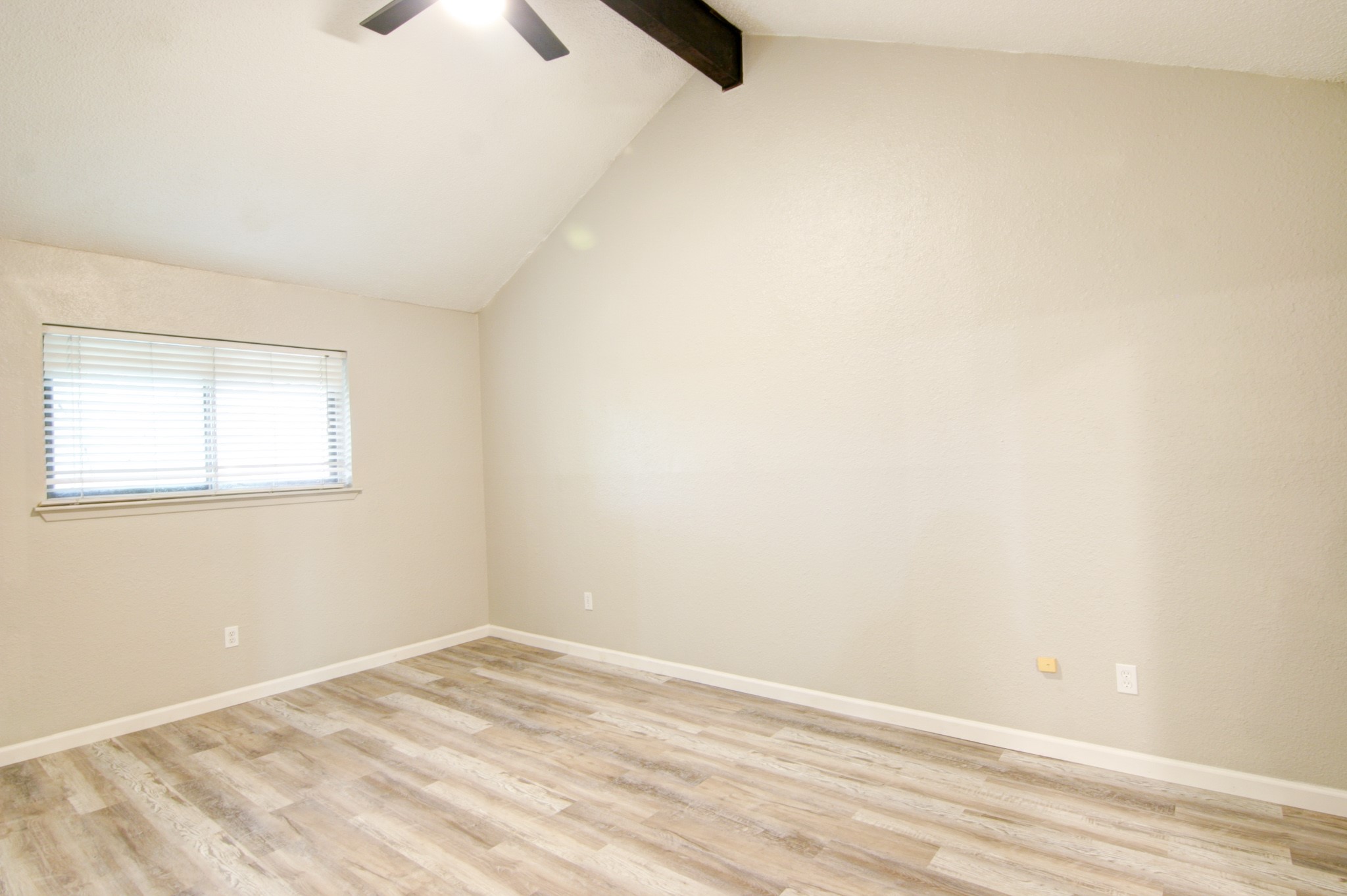 908 Echo Lane Austin, TX 78745 - Photo 15 of 24 a view of empty room with wooden floor