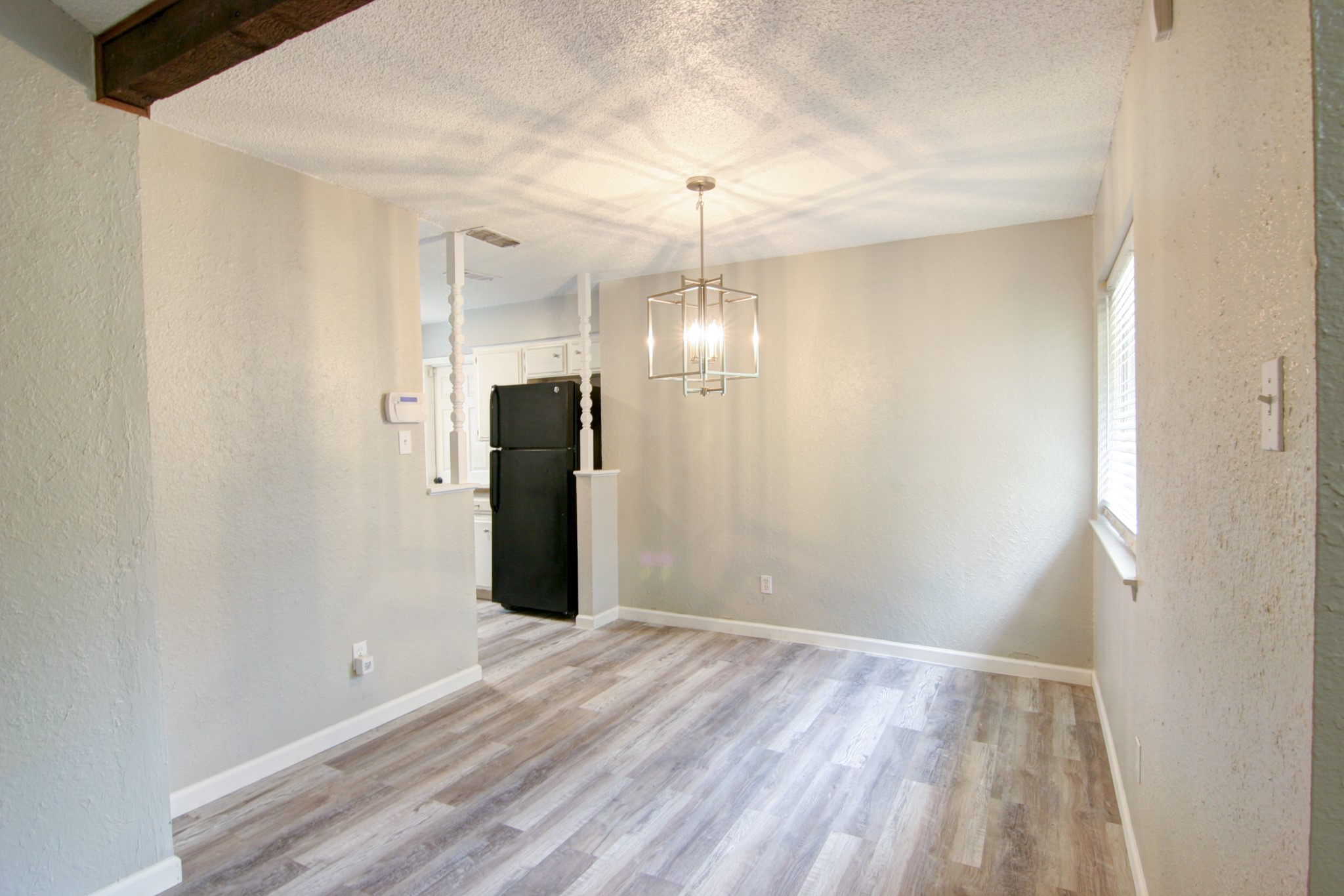 908 Echo Lane Austin, TX 78745 - Photo 8 of 24 a view of a room with a hallway