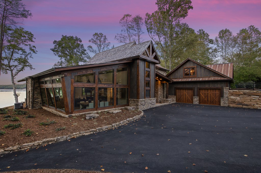 701 Eaton Road Blue Ridge, GA 30513 - Photo 91 of 98 a front view of a house with a garden