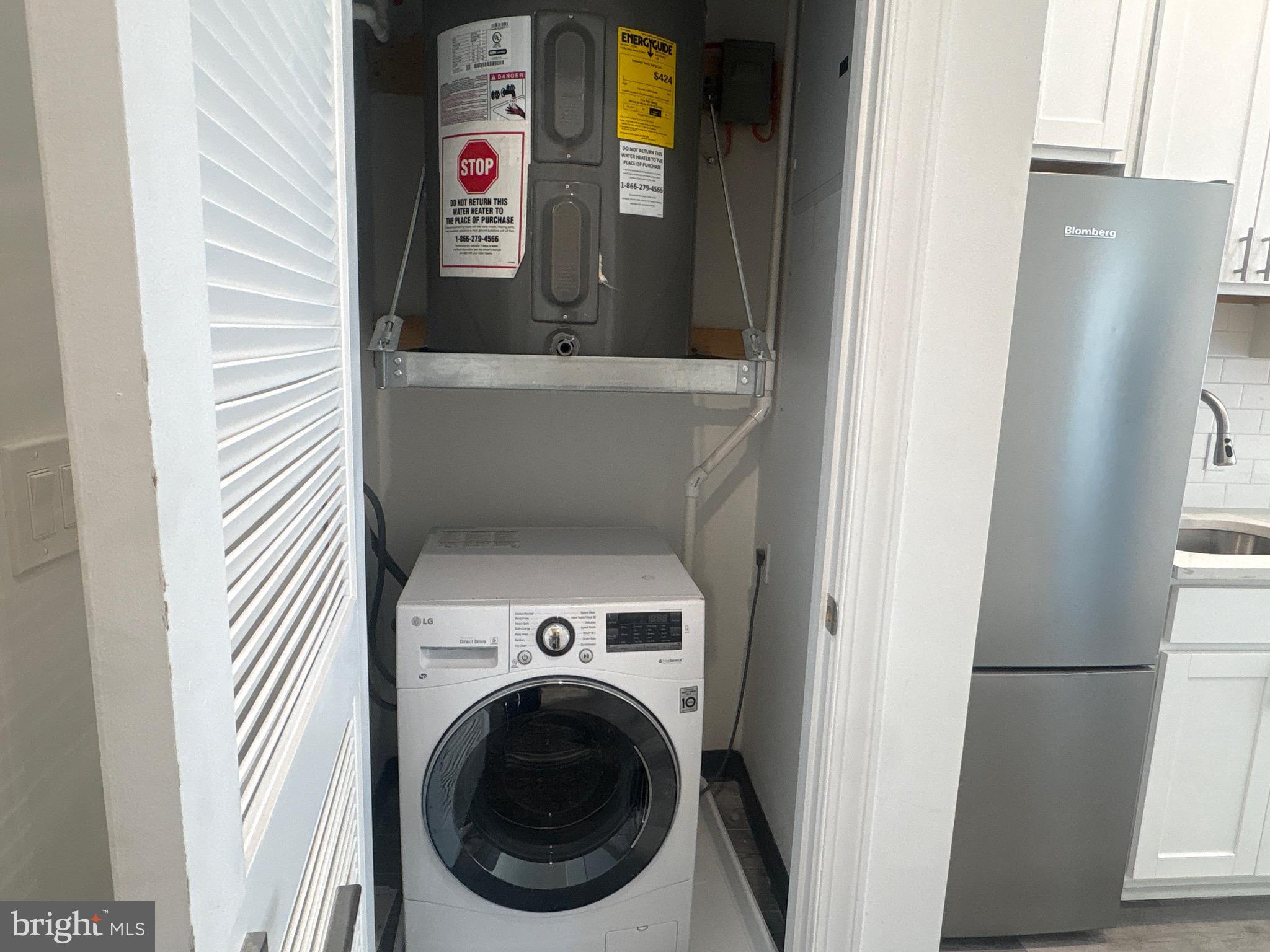 818 Bladensburg Road Northeast, Unit 408 Washington, DC 20002 - Photo 6 of 10 a close up view of a washer and dryer