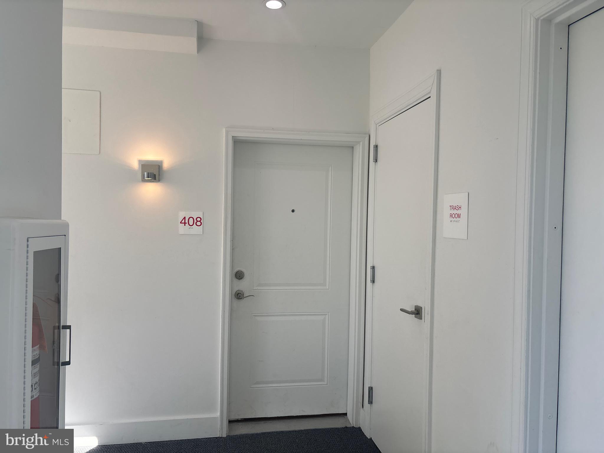 818 Bladensburg Road Northeast, Unit 408 Washington, DC 20002 - Photo 9 of 10 a view of hallway with wooden floor