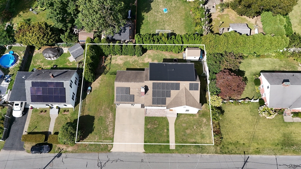 33 Harbeck Street Acushnet, MA 02743 - Photo 31 of 34 an aerial view of houses with outdoor space