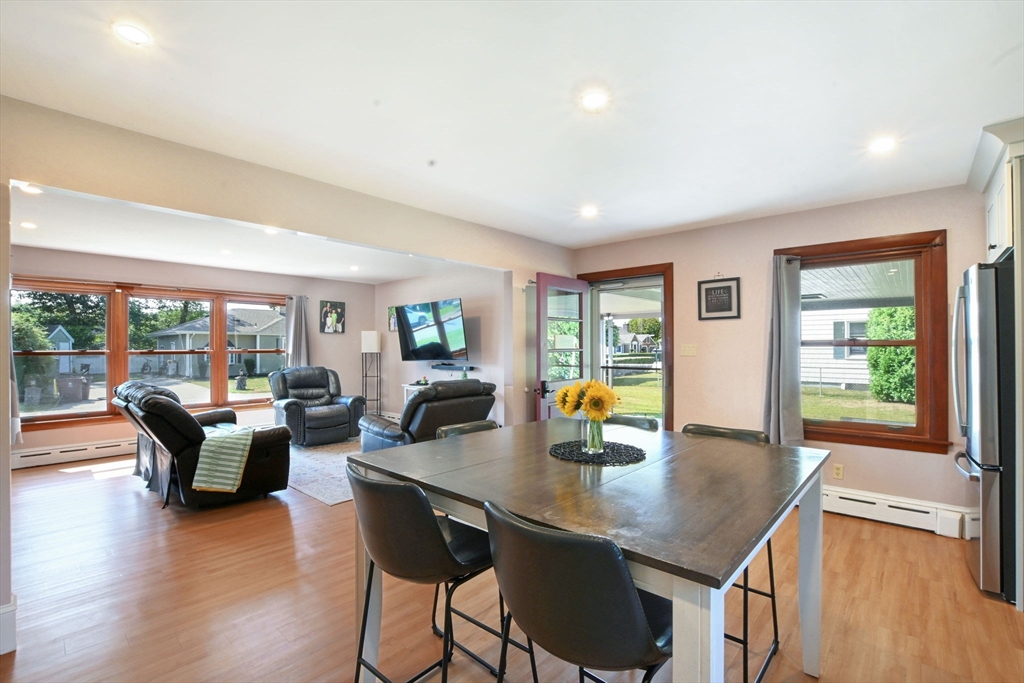 33 Harbeck Street Acushnet, MA 02743 - Photo 9 of 34 a view of a dining room with furniture window and wooden floor