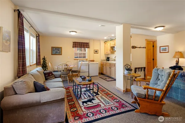 a living room with furniture and a window