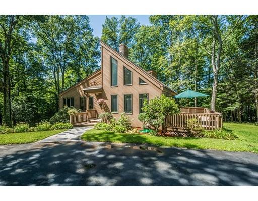 9 Sutcliffe Road Holland, MA 01521 - Photo 1 of 42 a front view of a house with garden