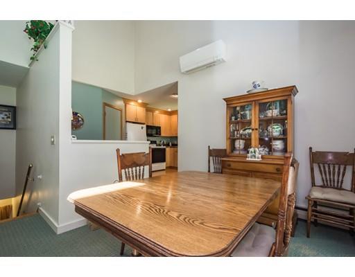 9 Sutcliffe Road Holland, MA 01521 - Photo 12 of 42 a living room with furniture and a table