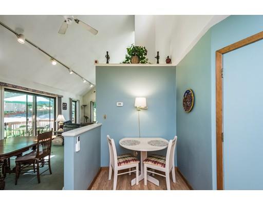 9 Sutcliffe Road Holland, MA 01521 - Photo 16 of 42 a view of kitchen with furniture window and wooden floor