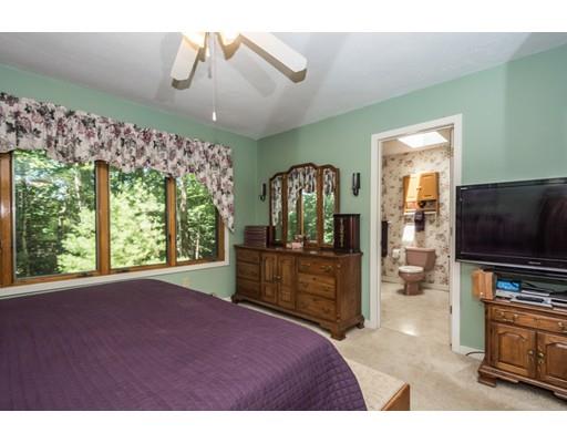 9 Sutcliffe Road Holland, MA 01521 - Photo 21 of 42 a bedroom with furniture and a flat screen tv
