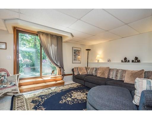 9 Sutcliffe Road Holland, MA 01521 - Photo 29 of 42 a living room with furniture and a large window