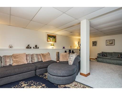 9 Sutcliffe Road Holland, MA 01521 - Photo 30 of 42 a living room with furniture and a rug