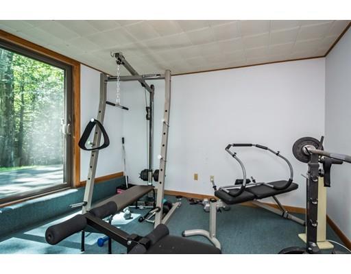 9 Sutcliffe Road Holland, MA 01521 - Photo 31 of 42 a room with gym equipment