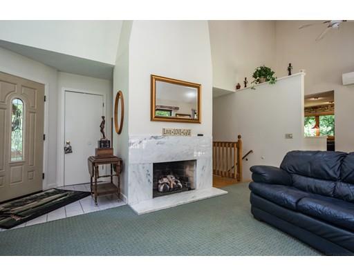 9 Sutcliffe Road Holland, MA 01521 - Photo 5 of 42 a living room with furniture and a fireplace