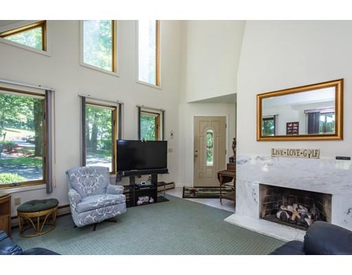 9 Sutcliffe Road Holland, MA 01521 - Photo 6 of 42 a living room with furniture and a fireplace