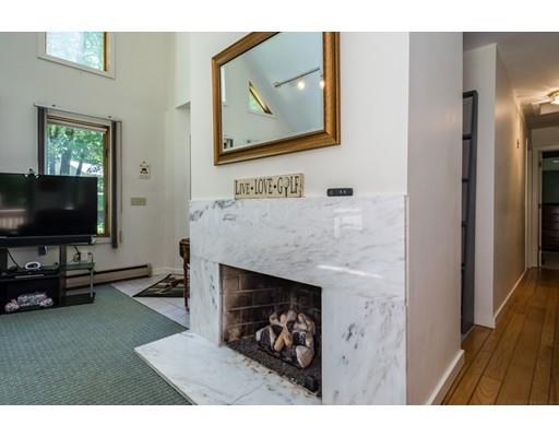 9 Sutcliffe Road Holland, MA 01521 - Photo 8 of 42 a living room with furniture and a flat screen tv