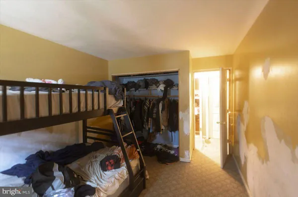 a view of room with door and windows