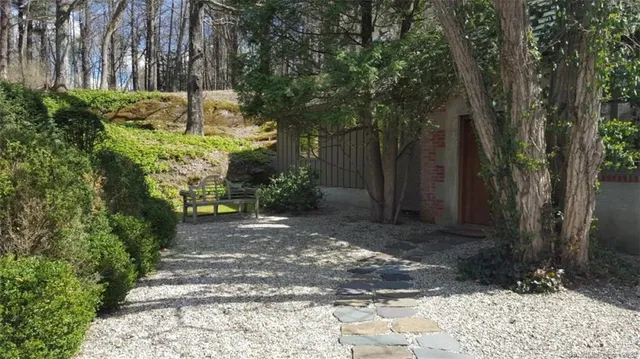 a view of a pathway of a yard