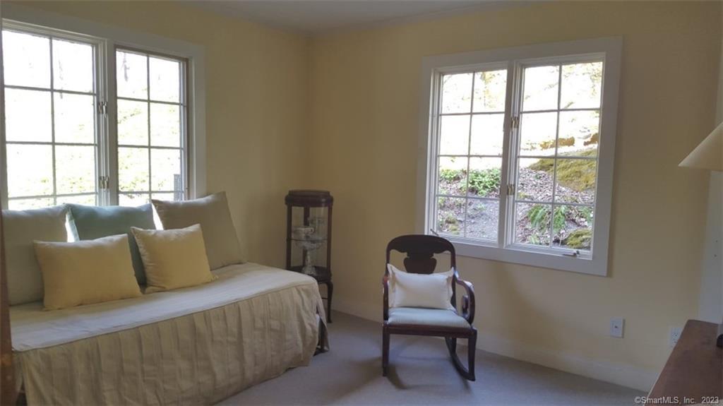 261 Taconic Road Salisbury, CT 06068 - Photo 16 of 20 a bedroom with a bed and a window