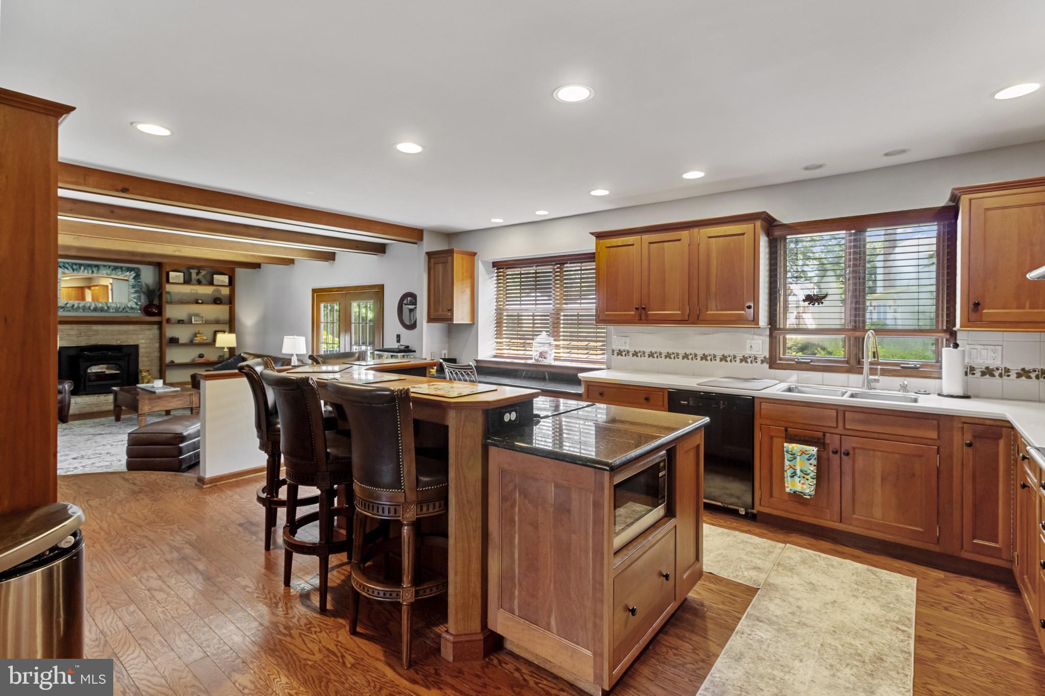 62 John Dyer Way Doylestown, PA 18902 - Photo 13 of 37 a kitchen with lots of counter top space and dining table