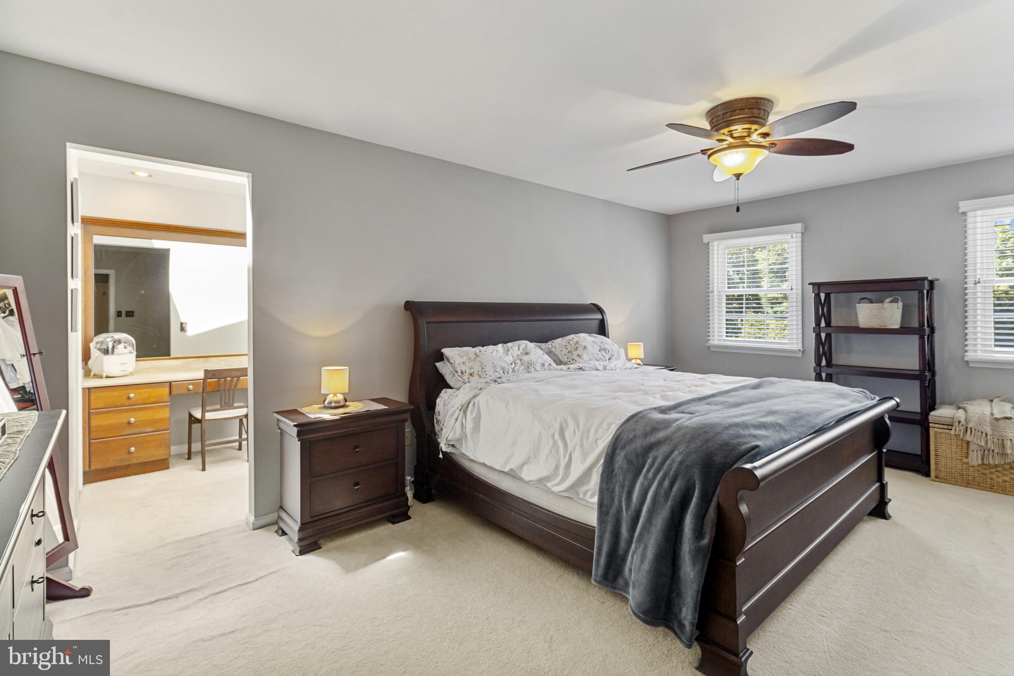 62 John Dyer Way Doylestown, PA 18902 - Photo 18 of 37 a bedroom with a bed and a chandelier