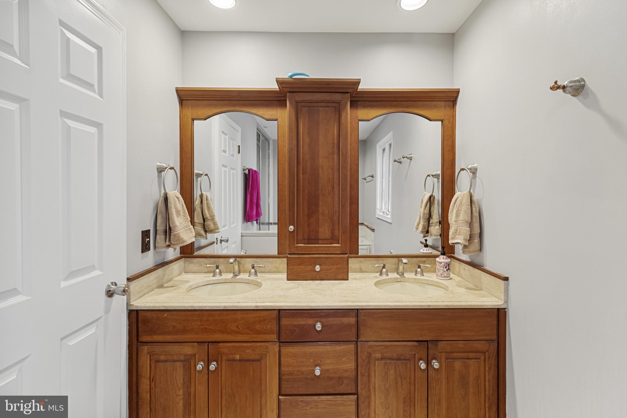 62 John Dyer Way Doylestown, PA 18902 - Photo 22 of 37 a bathroom with a double vanity sink and a mirror