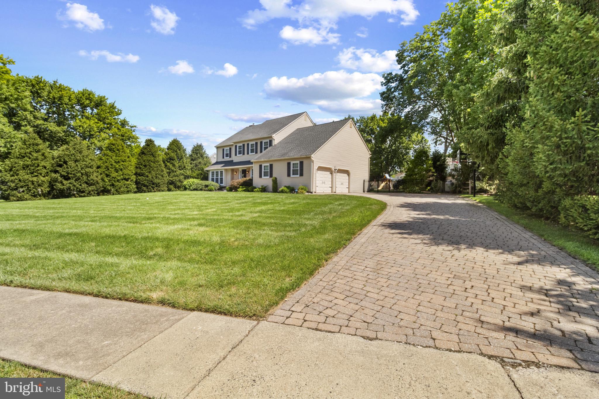 62 John Dyer Way Doylestown, PA 18902 - Photo 3 of 37 a front view of a house with a yard and trees
